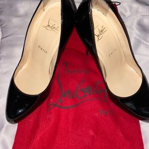 Christian Louboutin black patent leather pumps